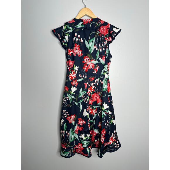 hi there from Karen Walker Women's Navy Floral‎ Faux Wrap Dress Size L NWT - Picture 9 of 9